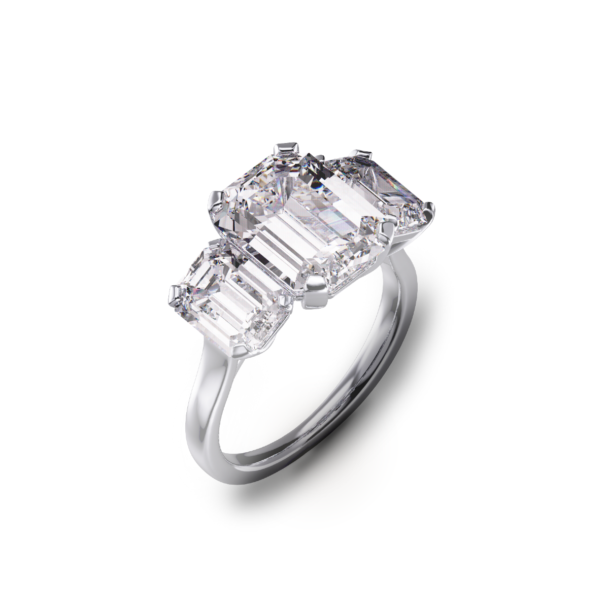 Three-stone emerald-cut diamond ring in platinum